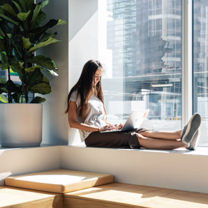 Employee working by window